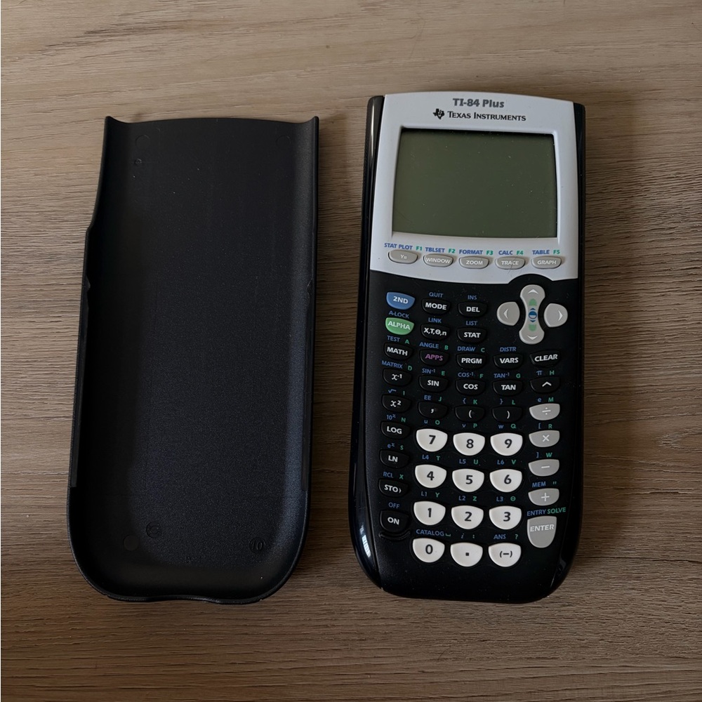 Texas Instruments TI-84 Plus Graphing Calculator - Black and White